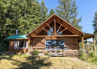 AP Ranch exterior Image of Cozy Canadian Cabin front porch area.