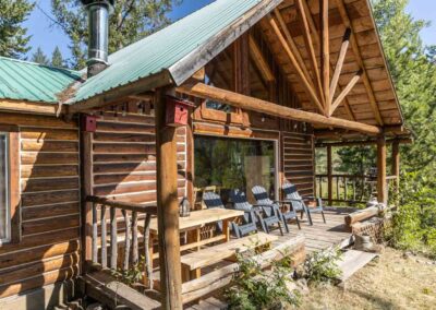 AP Ranch exterior Image of Cozy Canadian Cabin front porch area.
