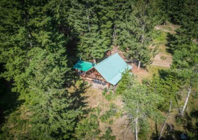 AP Ranch exterior Image of Cozy Canadian Cabin taken from a drone.