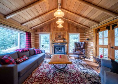 AP Ranch Interior Image of Cozy Canadian Cabin living room.