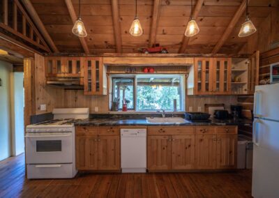 AP Ranch Interior Image of Cozy Canadian Cabin kitchen area.