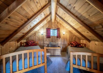 AP Ranch Interior Image of Cozy Canadian Cabin loft bedroom.